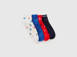 Four pairs of short socks with logos