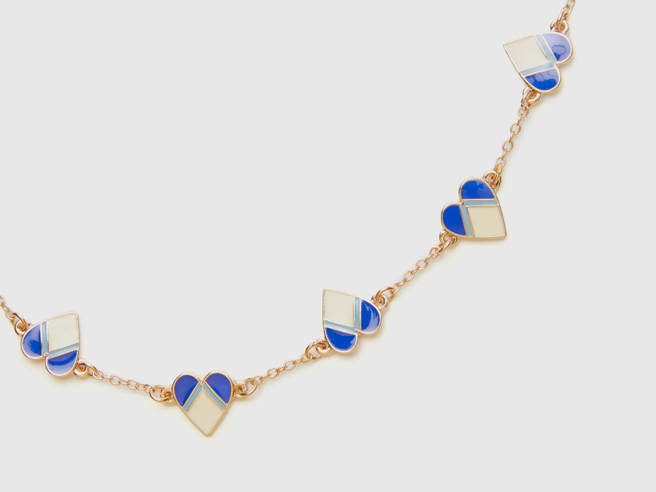 Gold bracelet with hearts