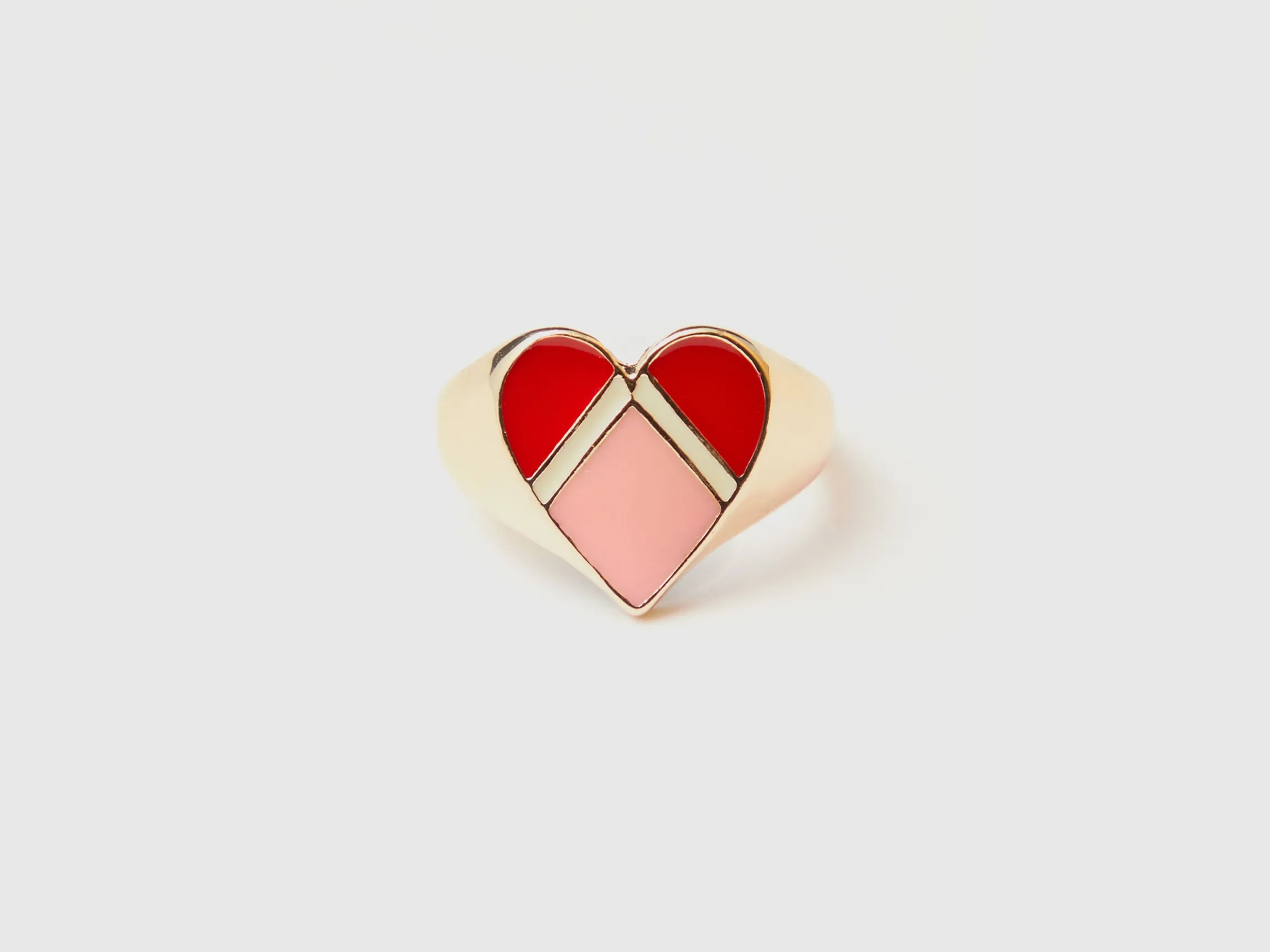 Gold ring with heart motif