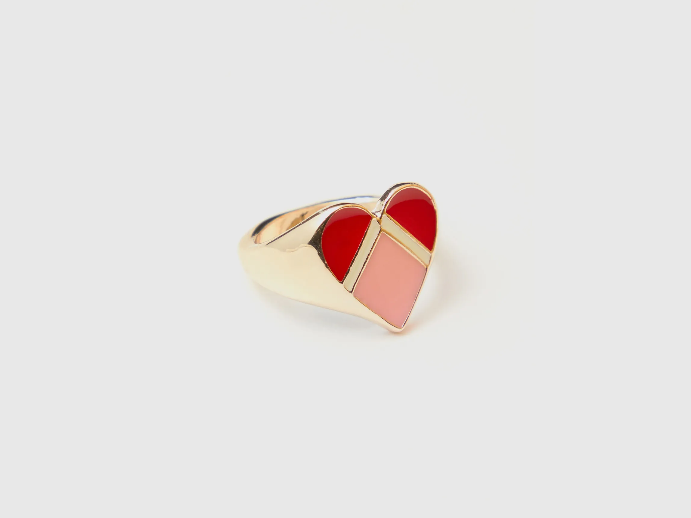 Gold ring with heart motif