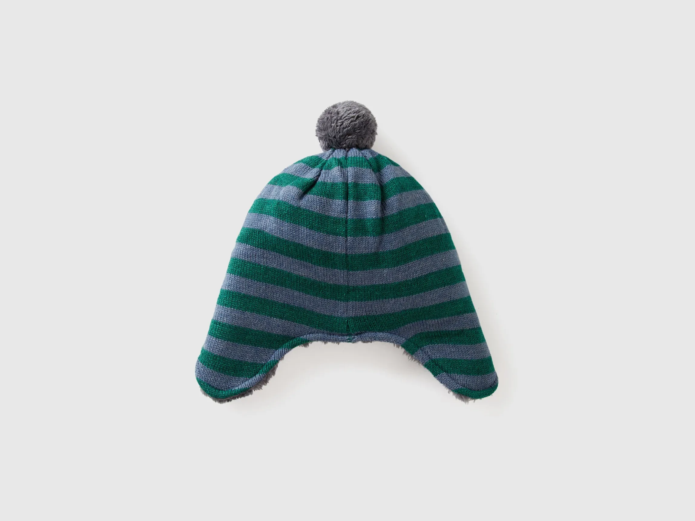 Hat with earflaps and pom pom
