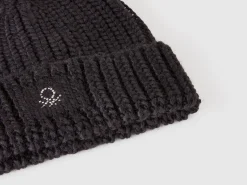 Hat with rhinestone logo