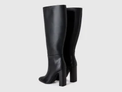 Heeled boots in imitation leather