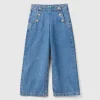 Jeans with jewel effect applique