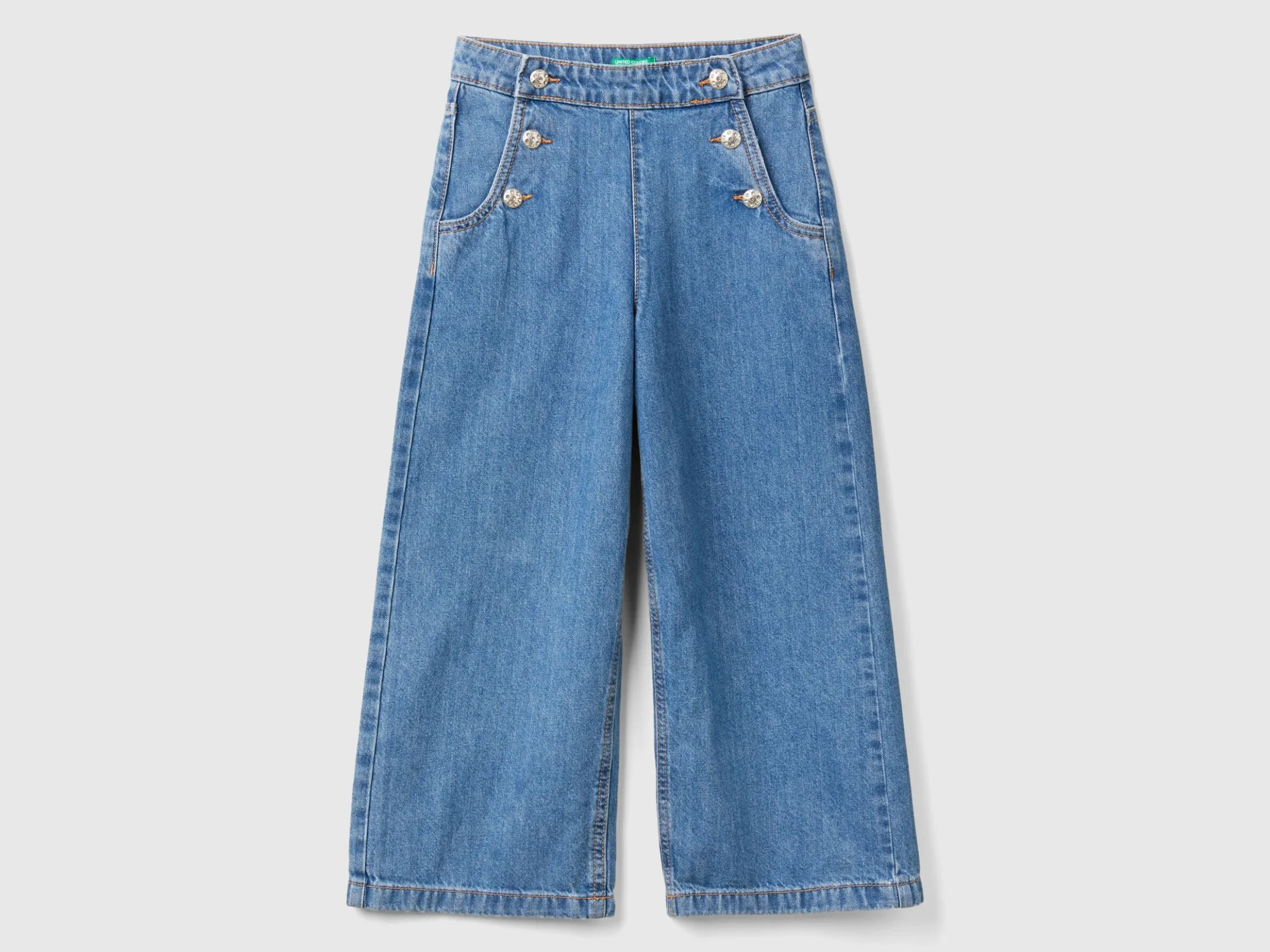 Jeans with jewel effect applique