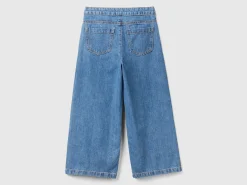 Jeans with jewel effect applique