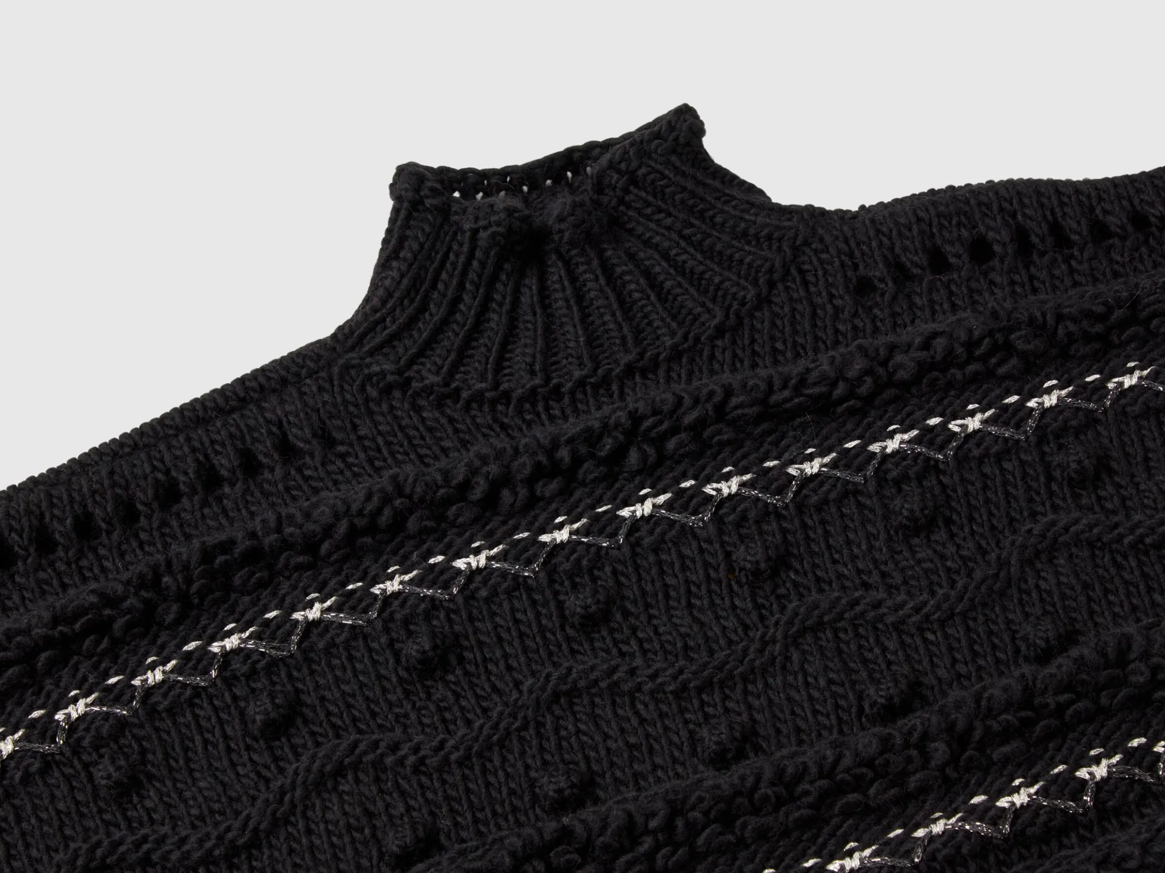 Knit cape with lurex