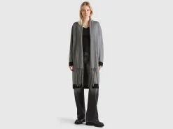 Knit coat with fringe