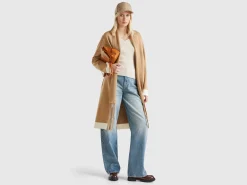 Knit coat with fringe