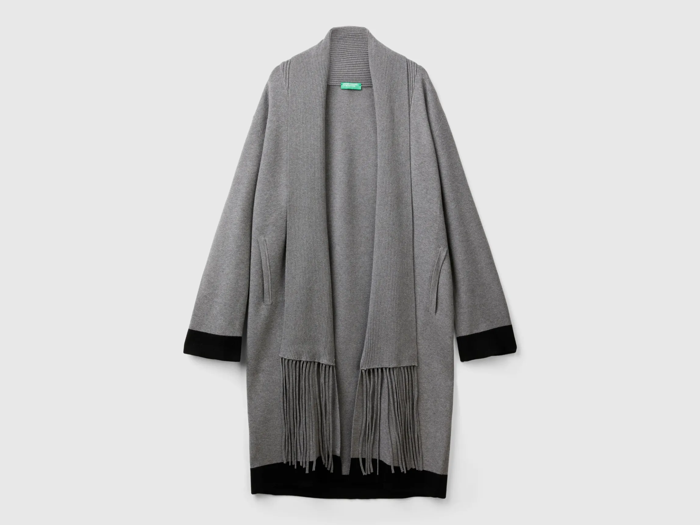 Knit coat with fringe