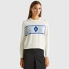 Knit sweater with inlay