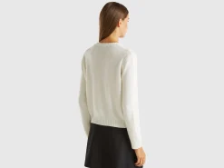 Knit sweater with inlay