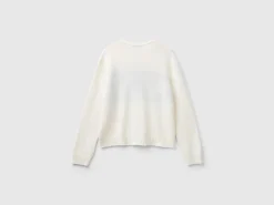 Knit sweater with inlay