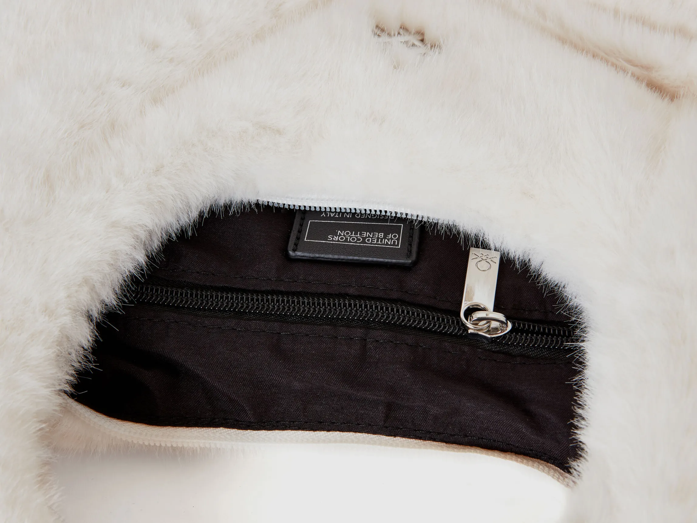 Large crescent moon bag in faux fur