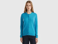 Light blue crew neck cardigan in pure Merino wool