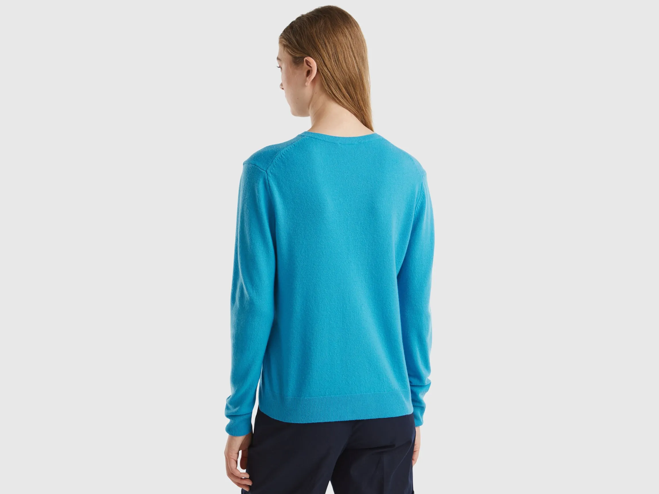 Light blue crew neck cardigan in pure Merino wool