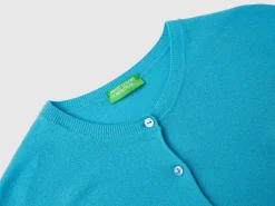 Light blue crew neck cardigan in pure Merino wool