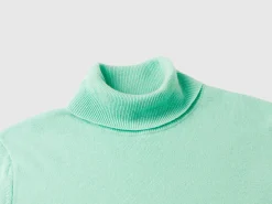 Light teal turtleneck sweater in pure Merino wool