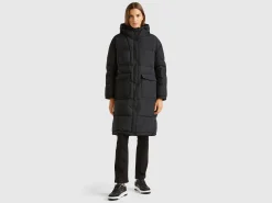 Long puffer jacket with recycled feathers