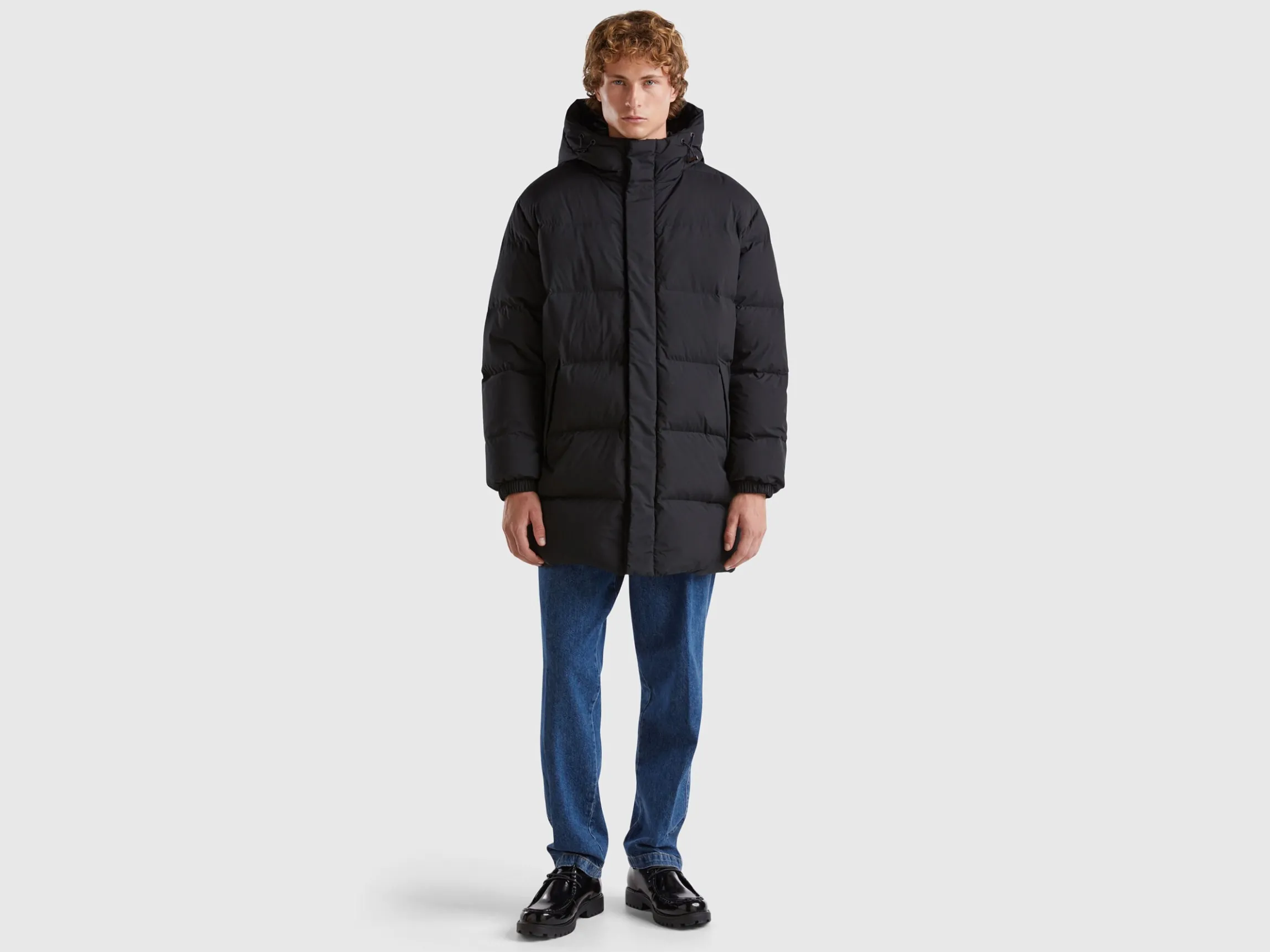 Long puffer jacket with recycled feathers
