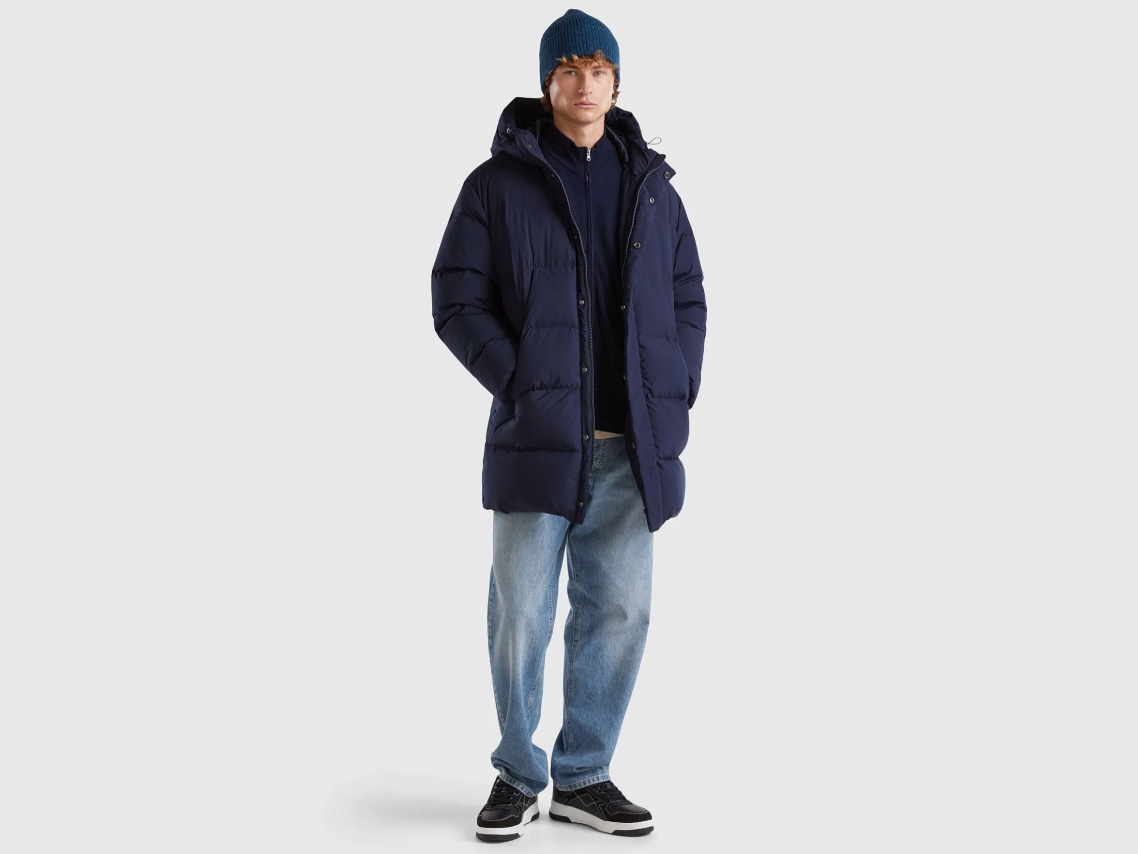 Long puffer jacket with recycled feathers