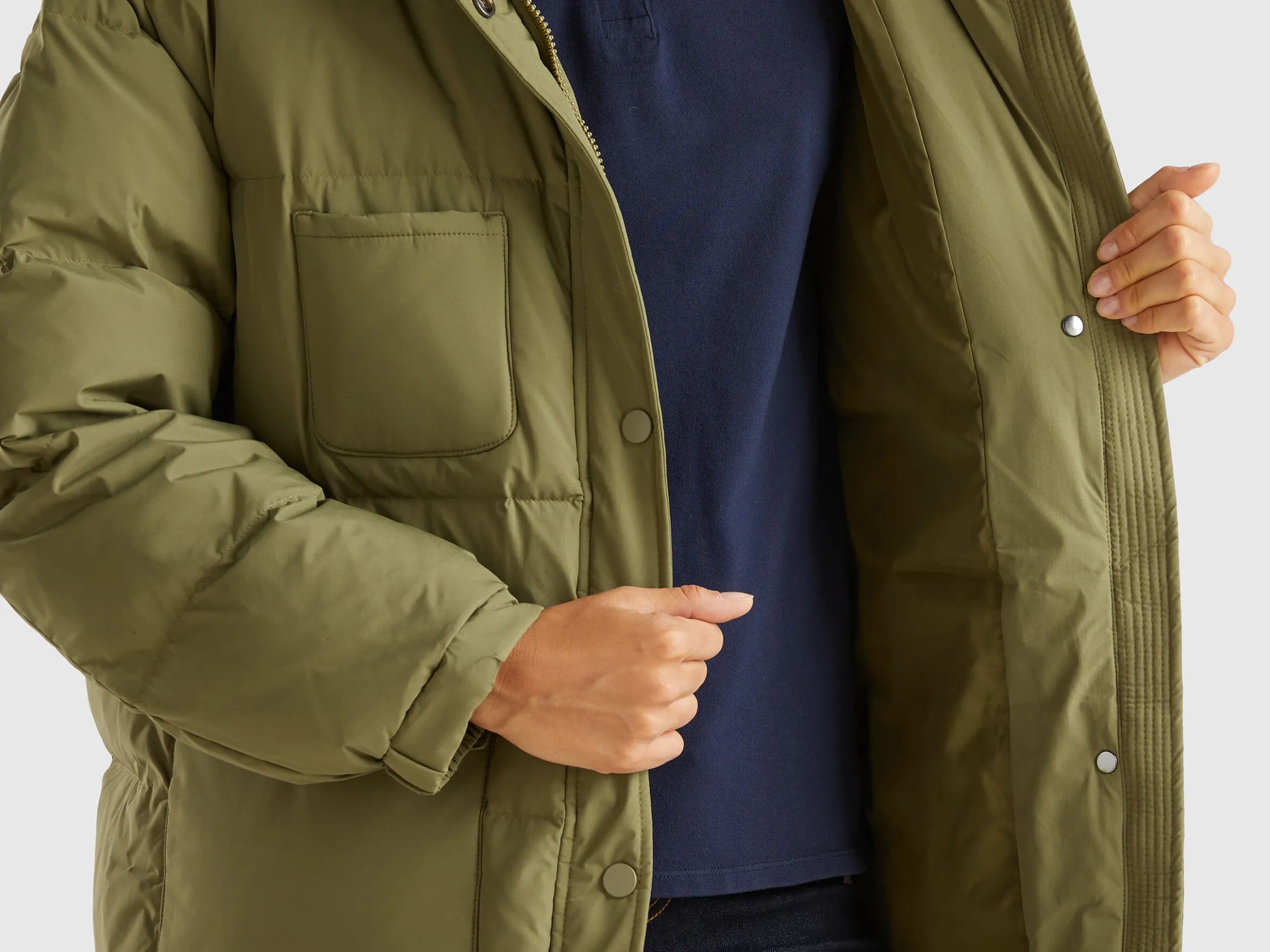 Long puffer jacket with recycled feathers