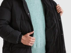 Long puffer jacket with recycled feathers