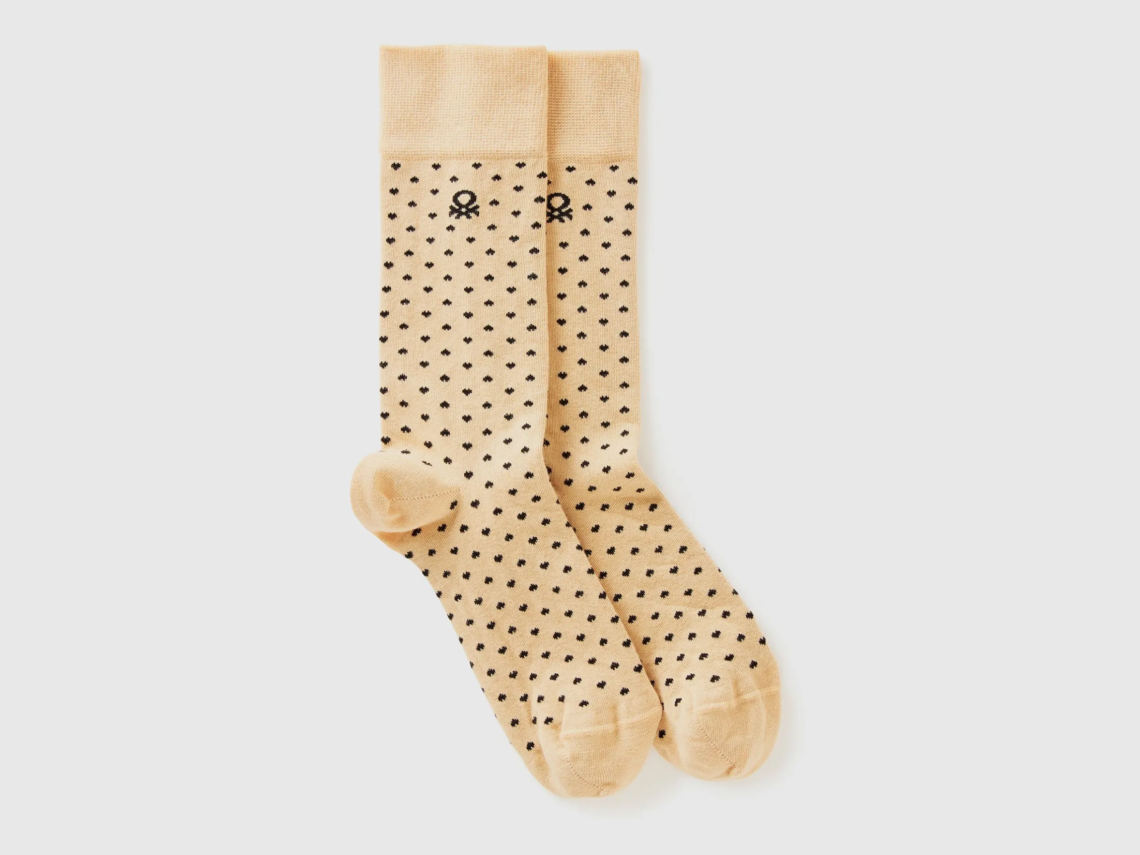 Long socks with beige hearts