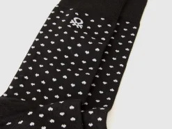 Long socks with black hearts