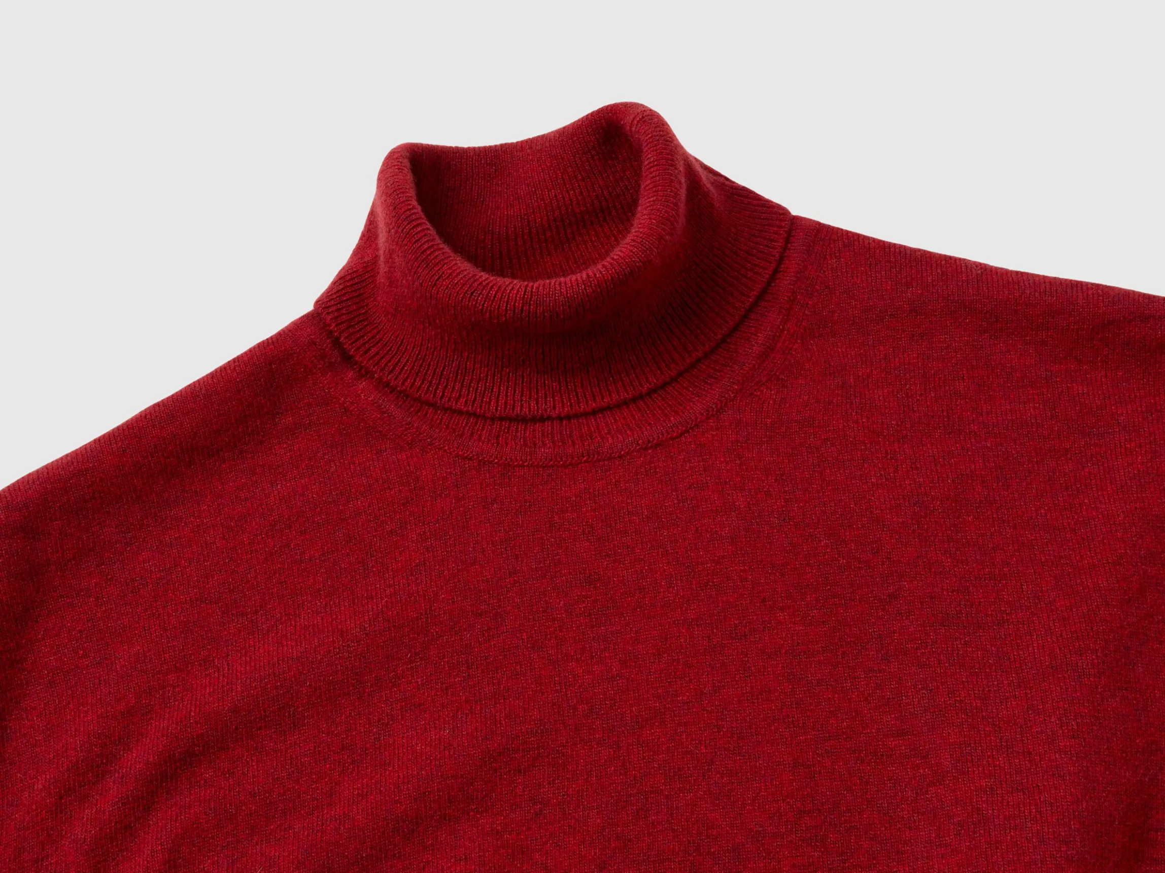 Marl red turtleneck in pure Merino wool