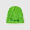 Neon green beanie with embroidery