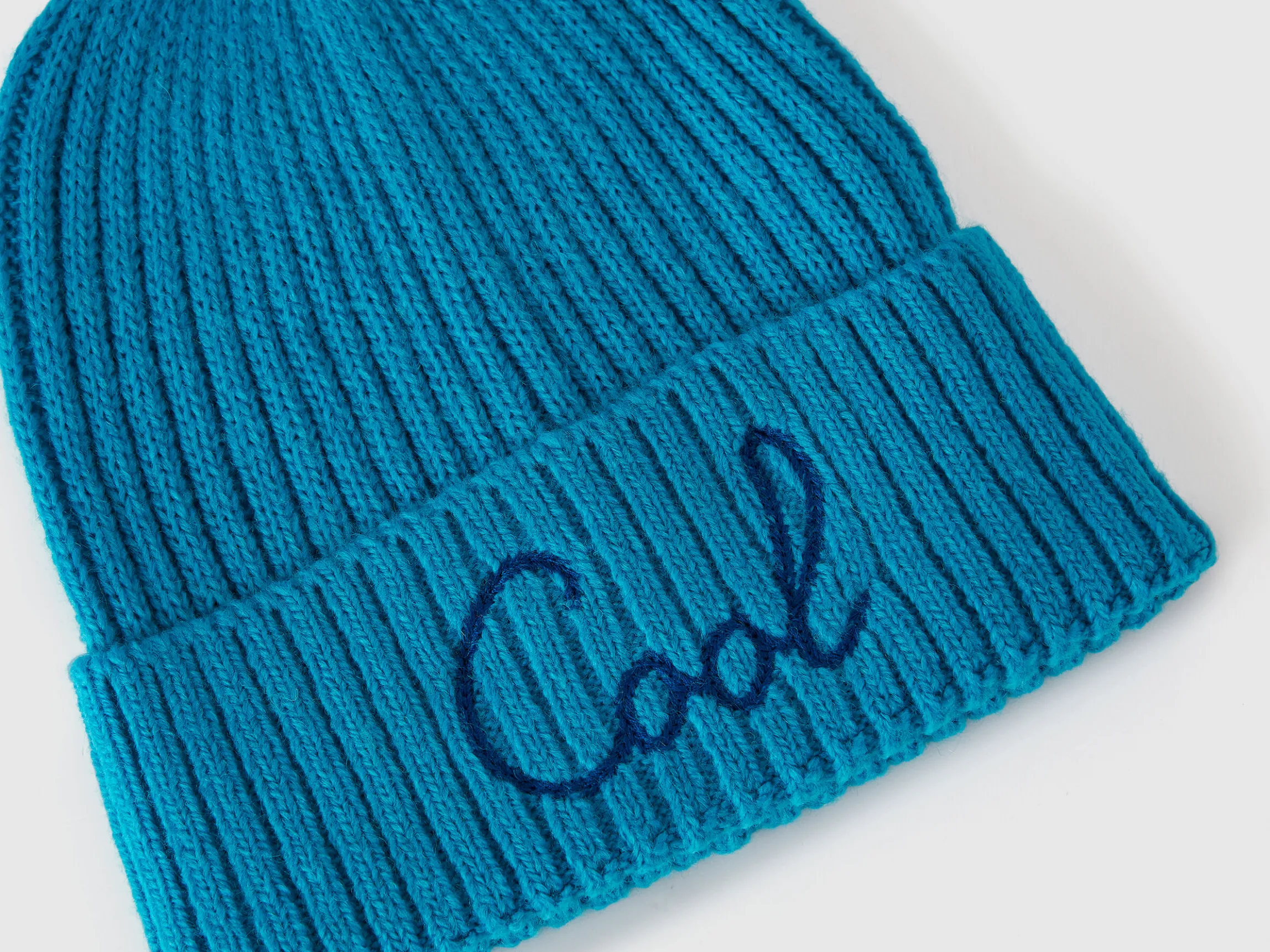 Neon light blue beanie with embroidery