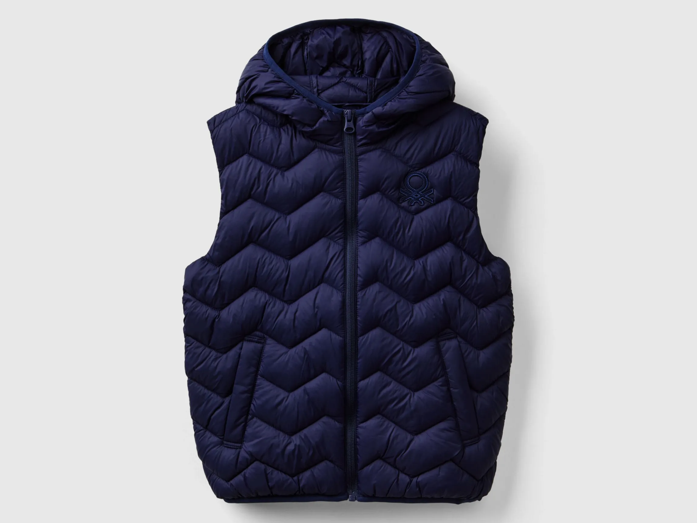 Padded vest with hood