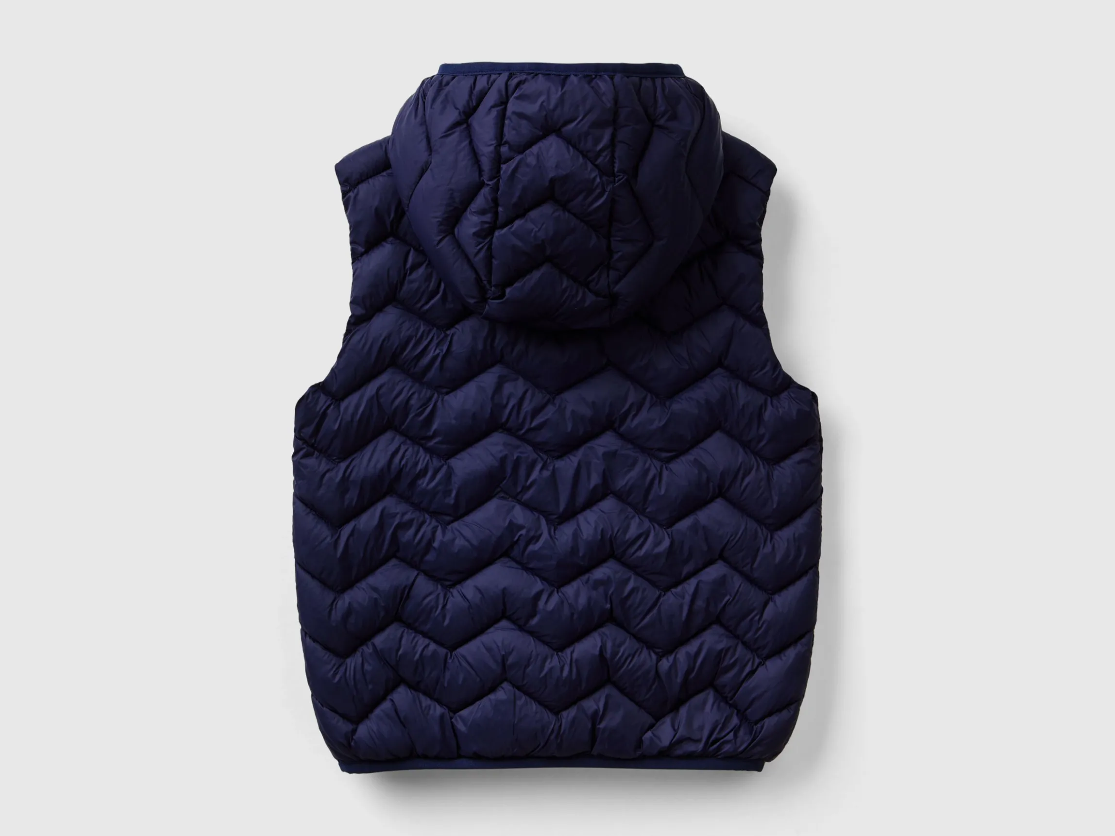 Padded vest with hood