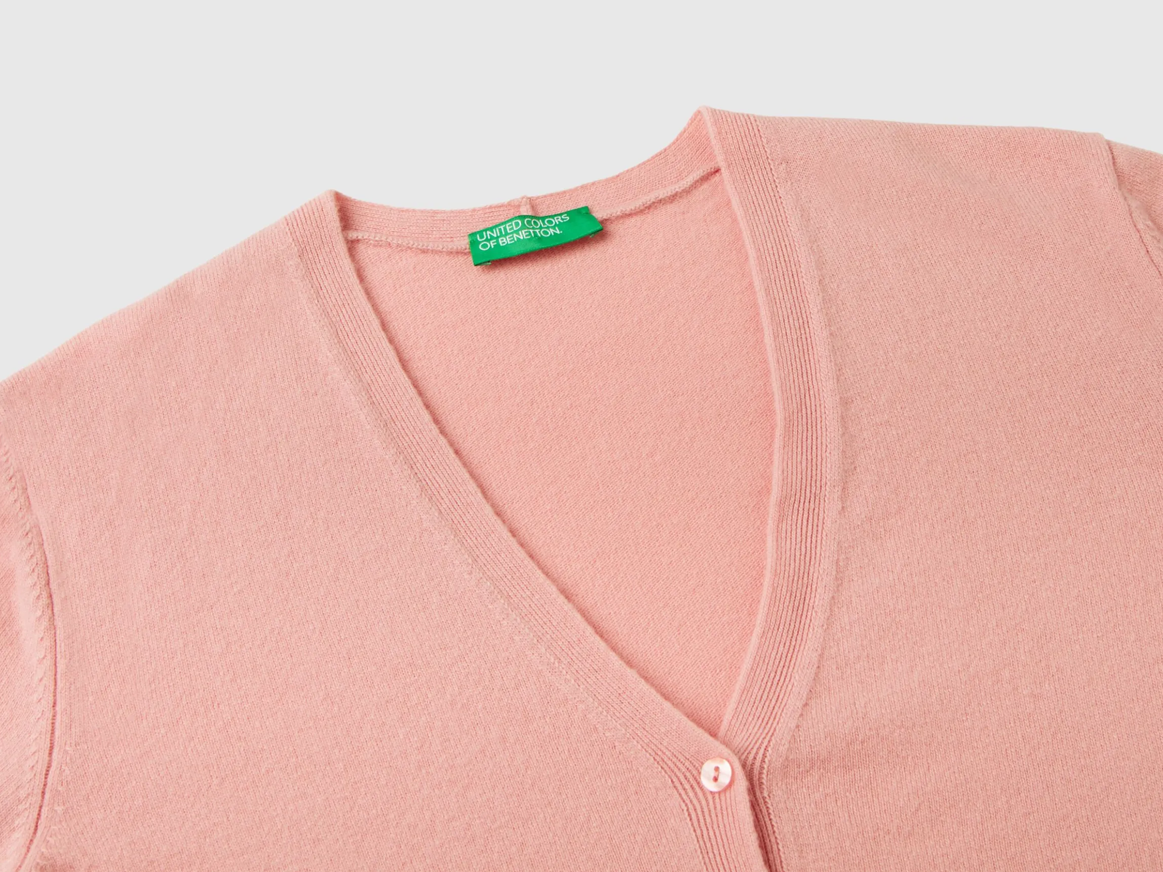 Pink V-neck cardigan in pure Merino wool