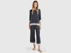 Polka dot trousers with lace details