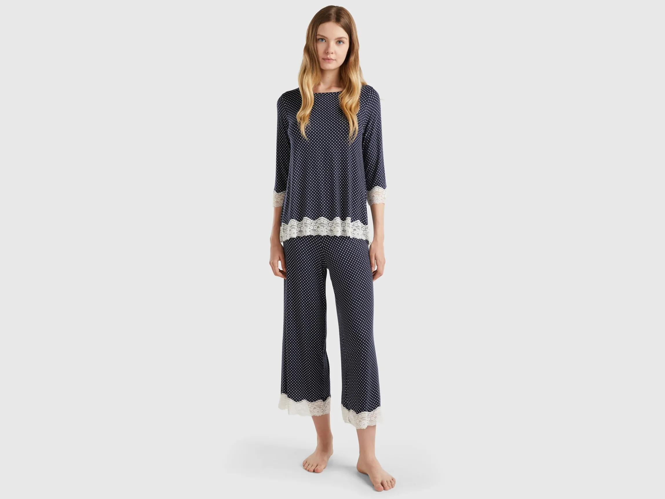 Polka dot trousers with lace details