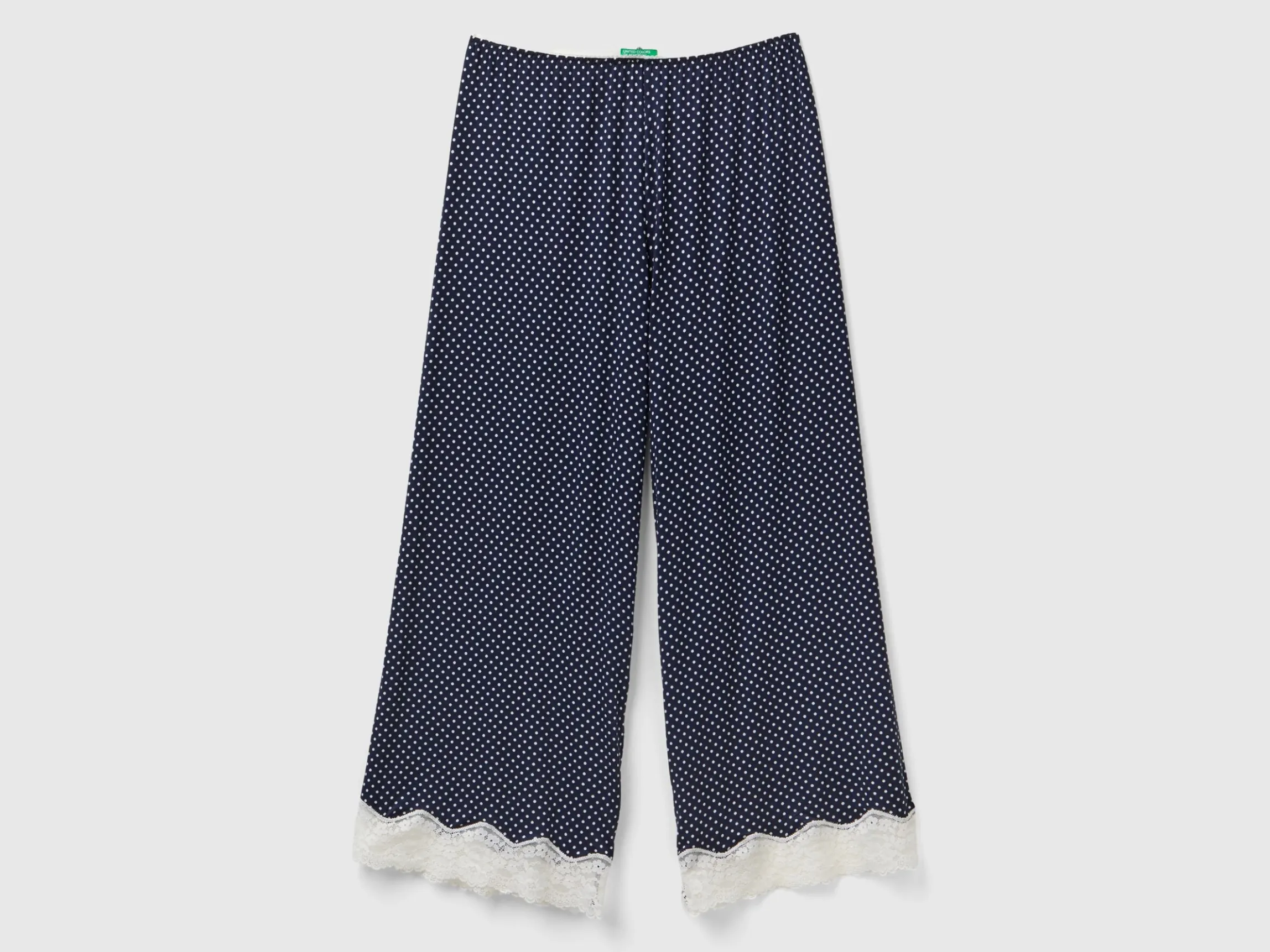 Polka dot trousers with lace details