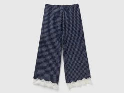 Polka dot trousers with lace details
