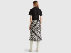 Polo-style dress with printed skirt