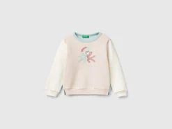 Pullover sweatshirt with glittery print