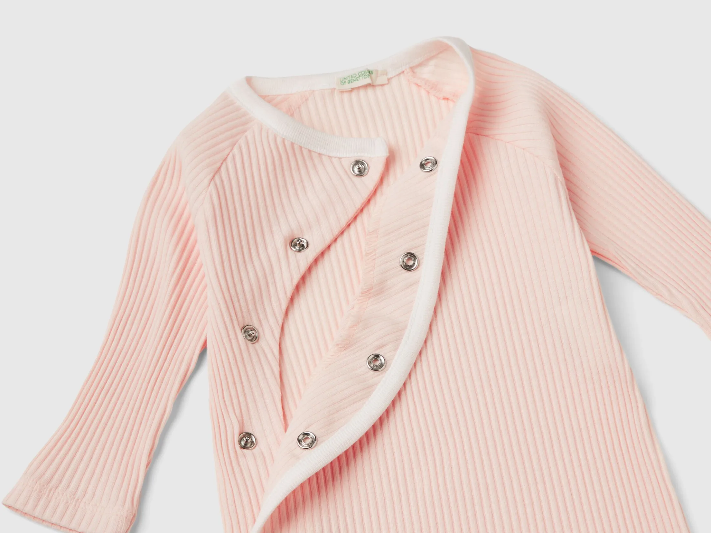 Ribbed onesie in organic cotton