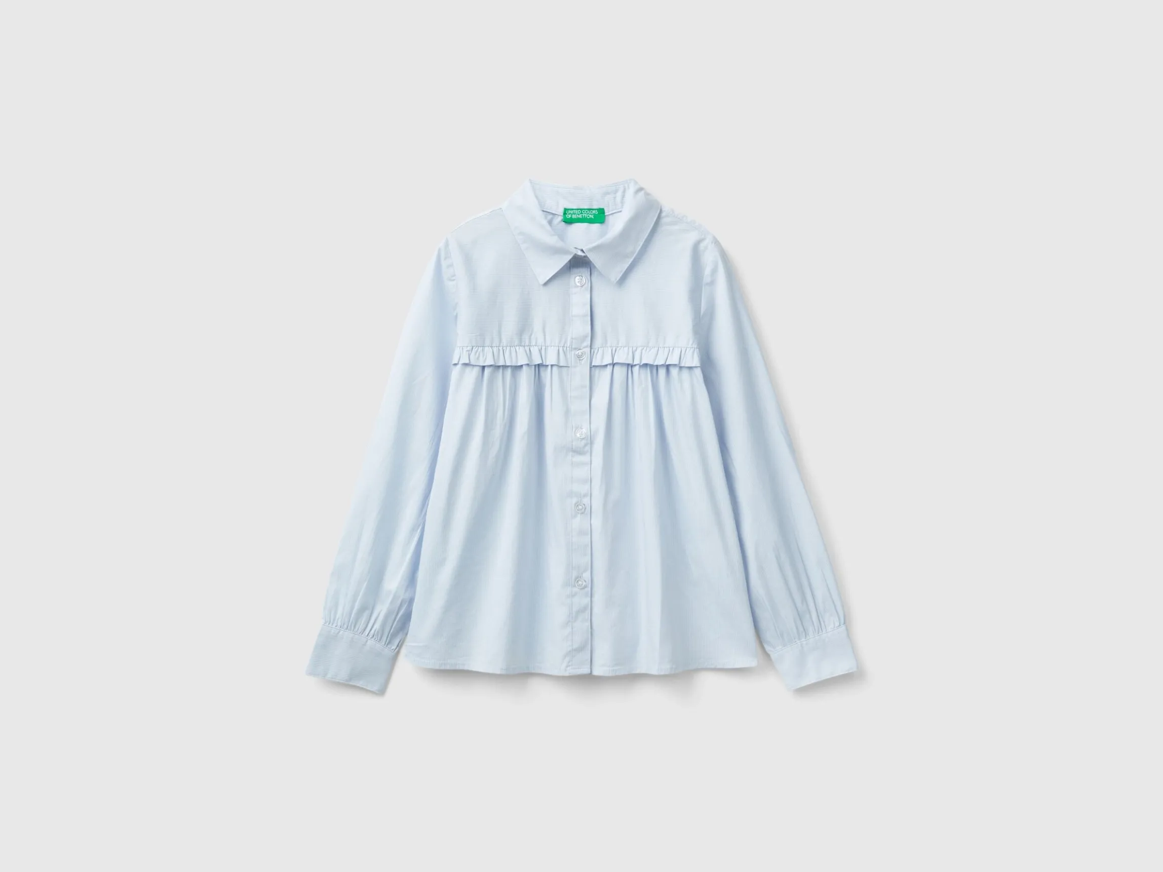 Shirt with rouches on the yoke