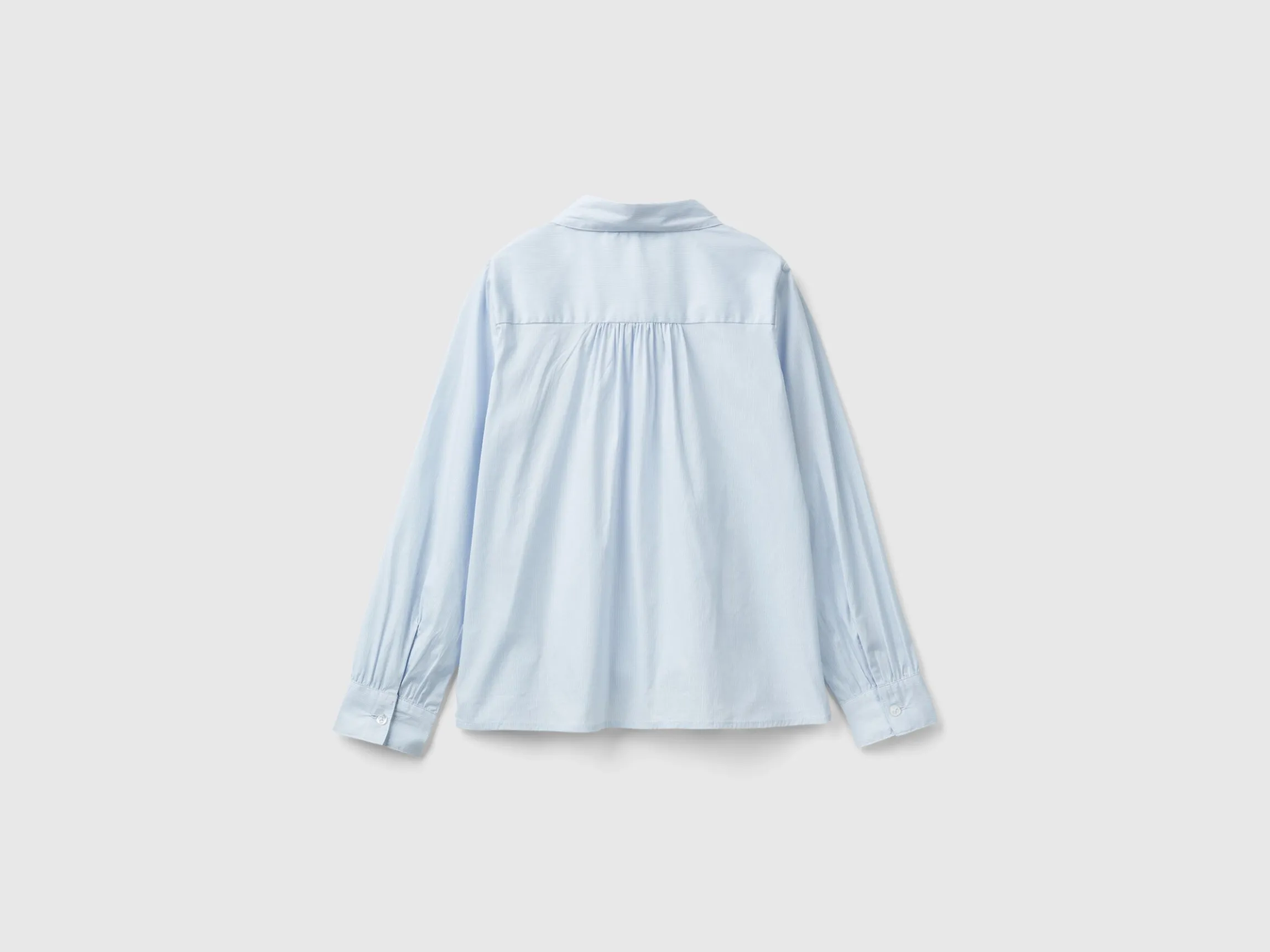 Shirt with rouches on the yoke