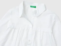Shirt with rouches on the yoke