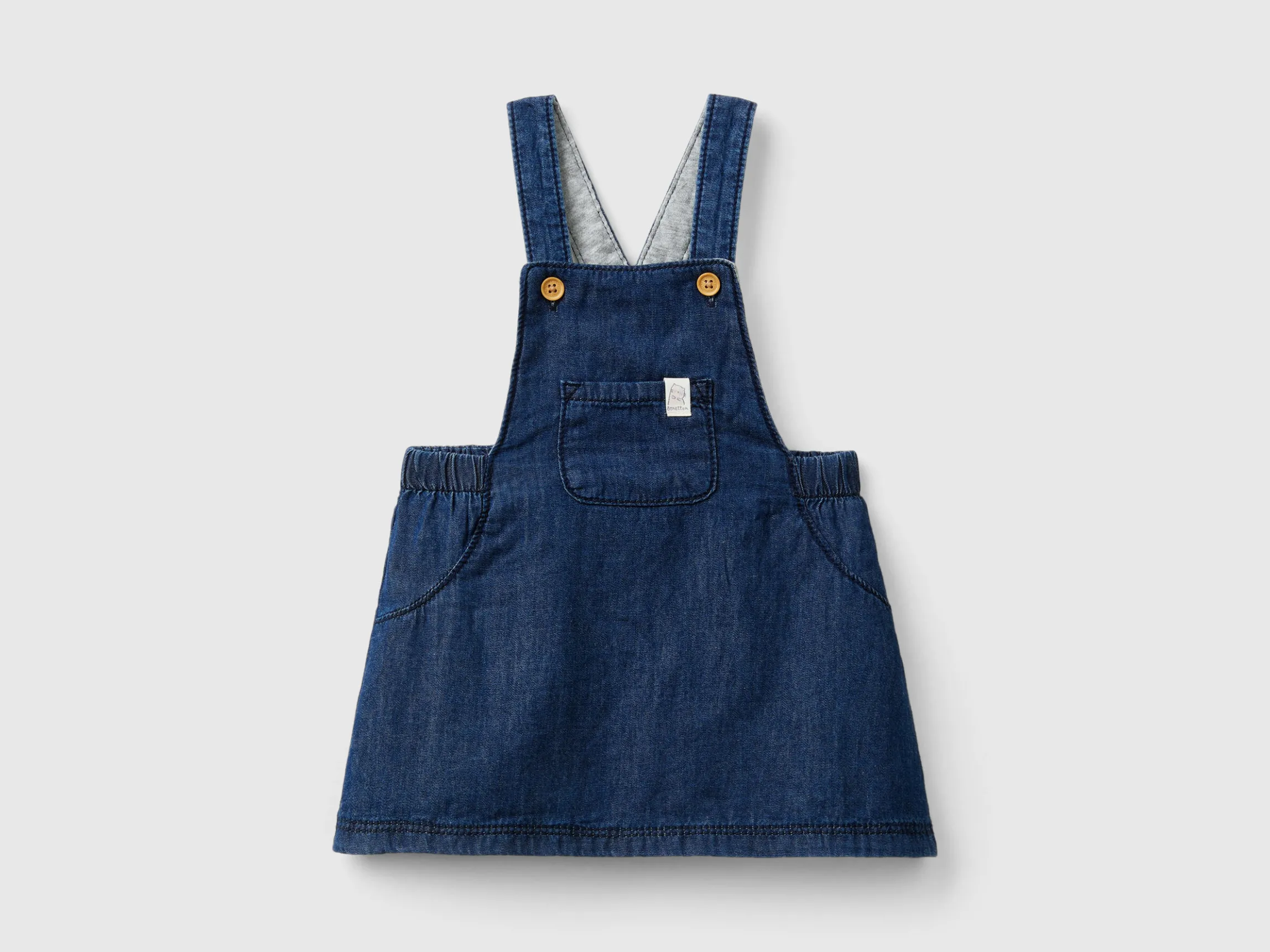Skirt overalls in chambray