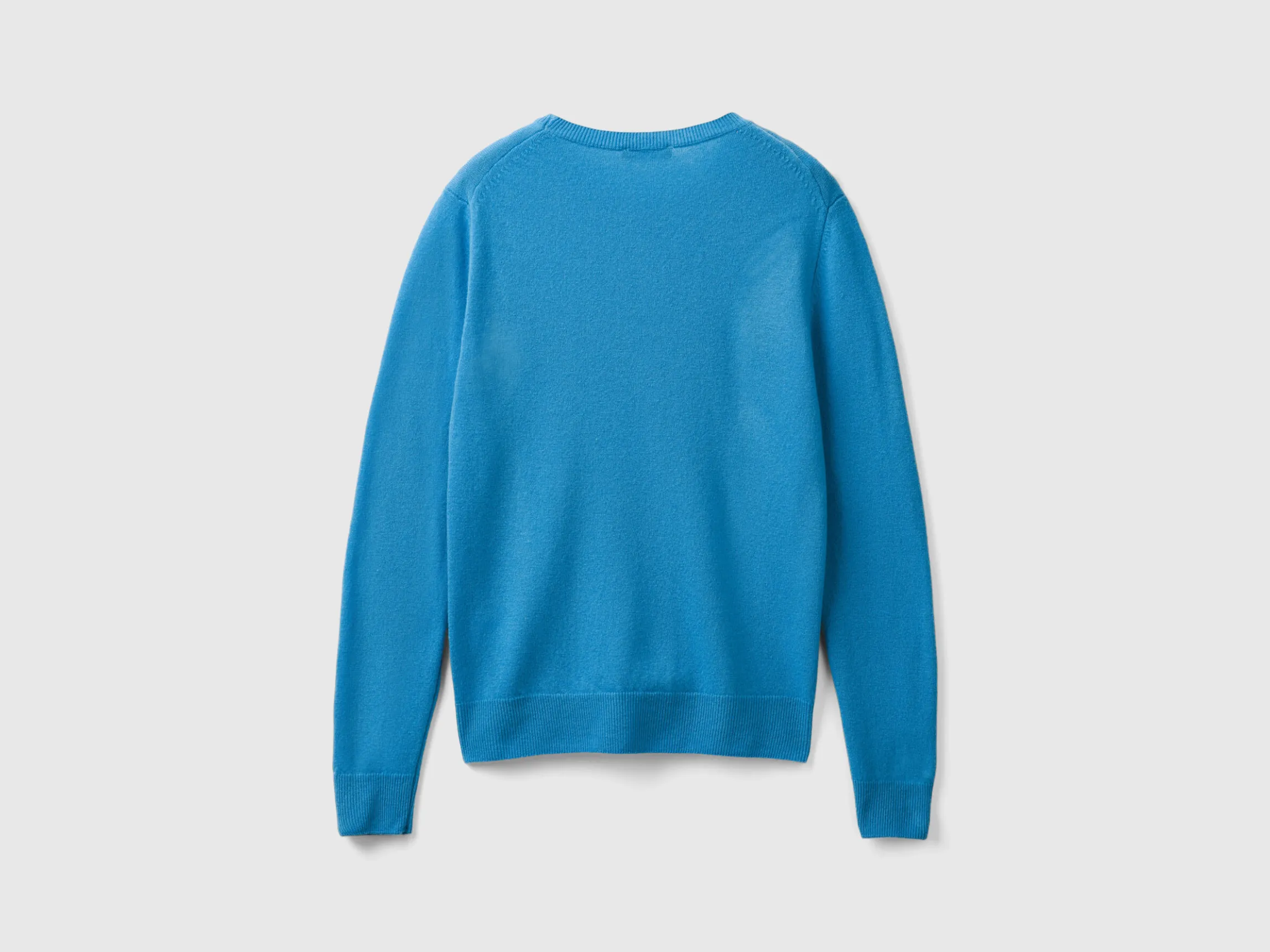 Sky blue crew neck sweater in pure Merino wool