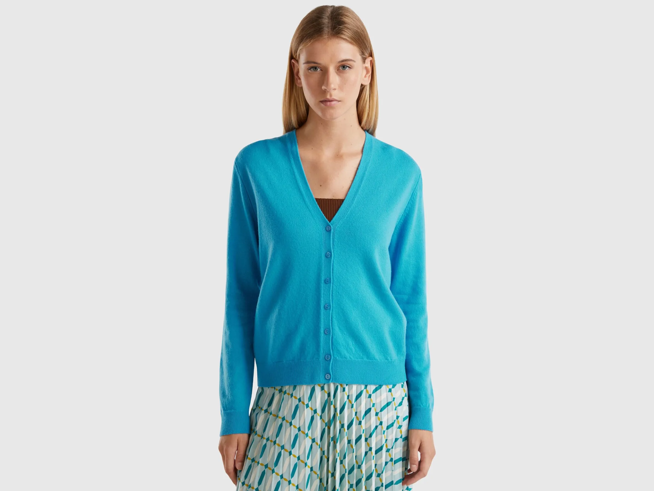 Sky blue V-neck cardigan in pure Merino wool