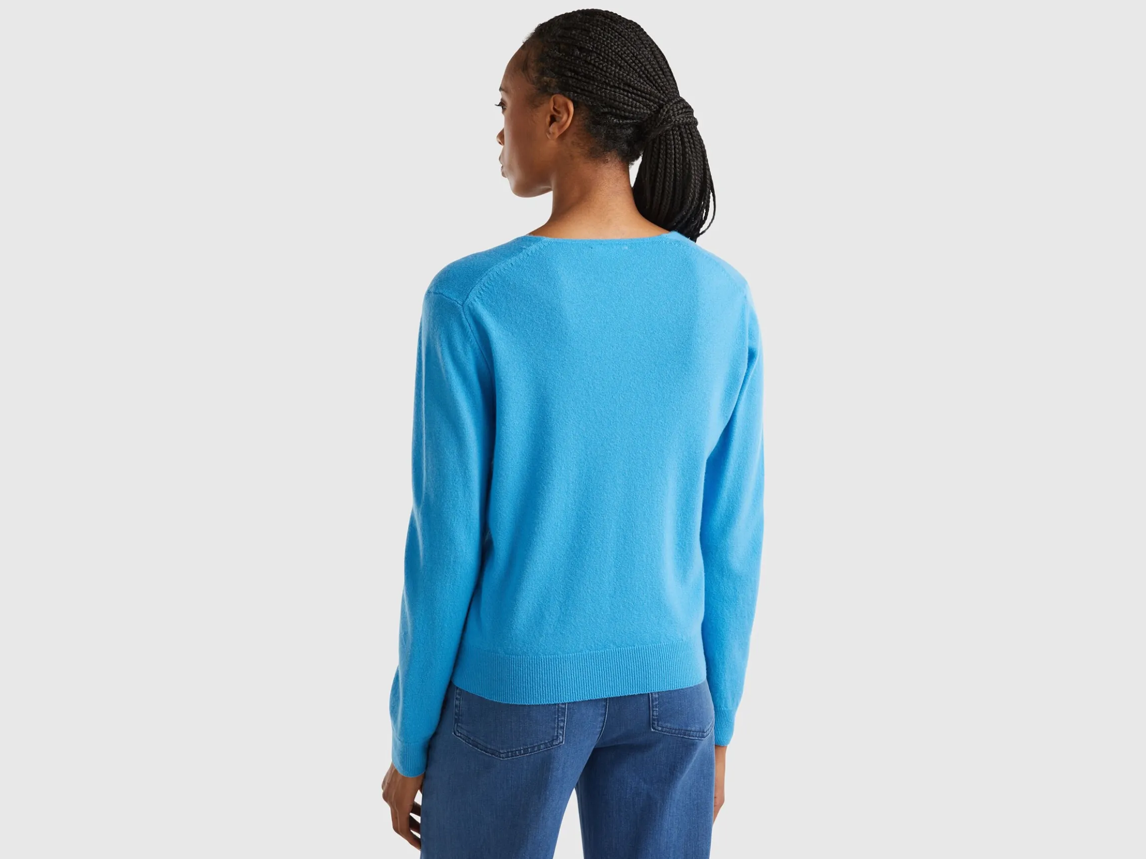 Sky blue V-neck sweater in pure Merino wool