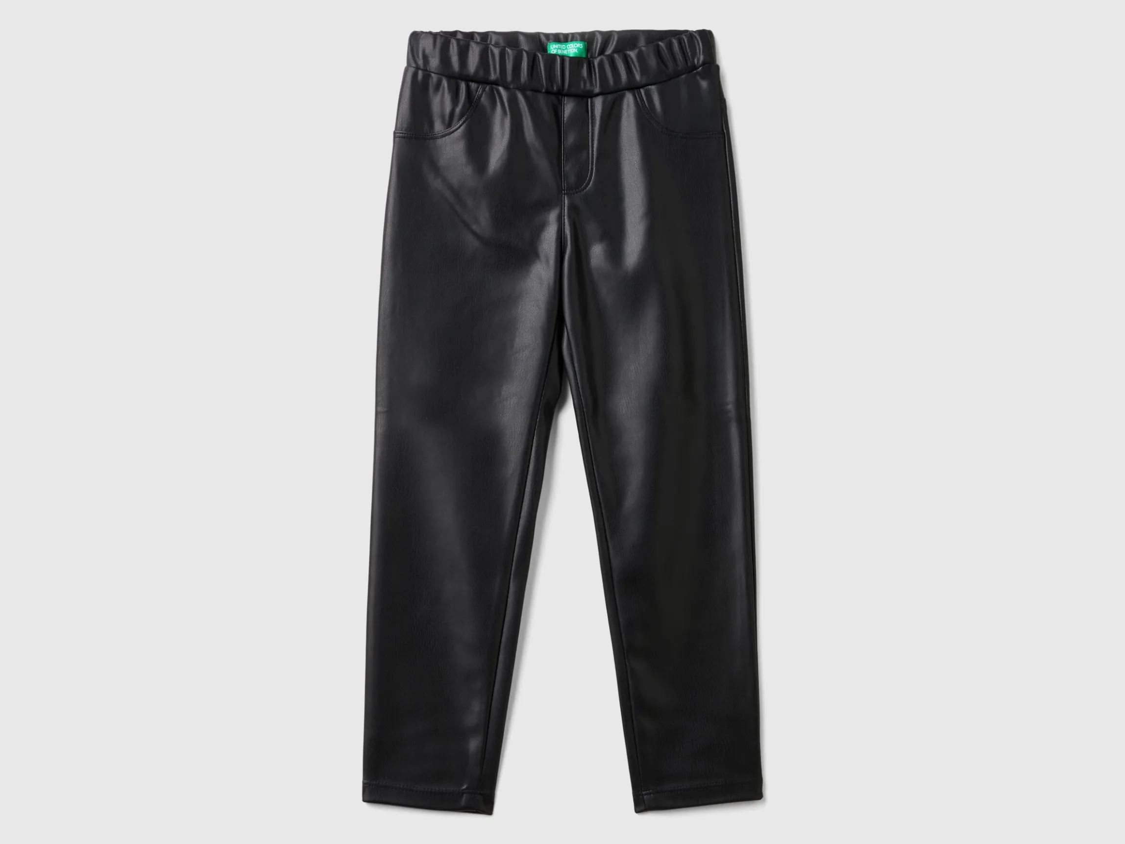 Slim fit trousers in imitation leather fabric